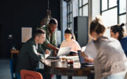 Diverse Team Working Together in Modern Co-Working Space